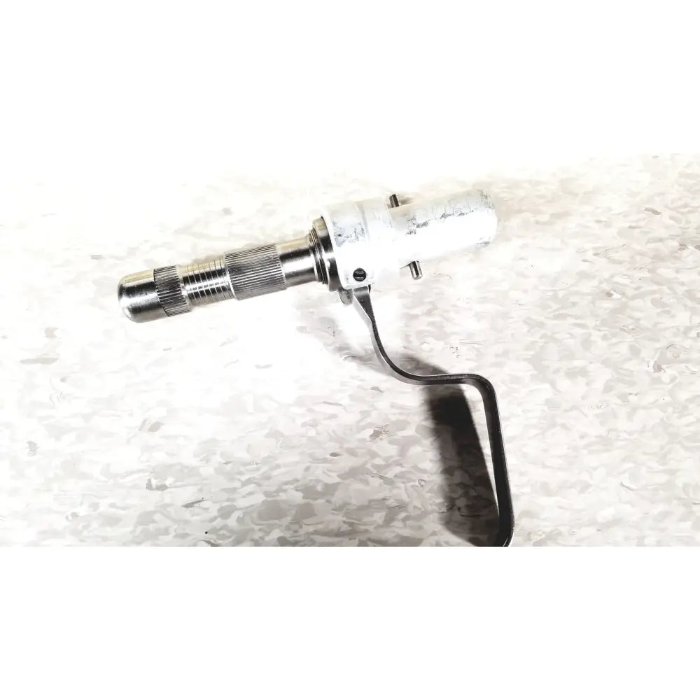 Silver metallic lever with textured grip and white plastic housing for 3m driver ii autoclave tray air powered set