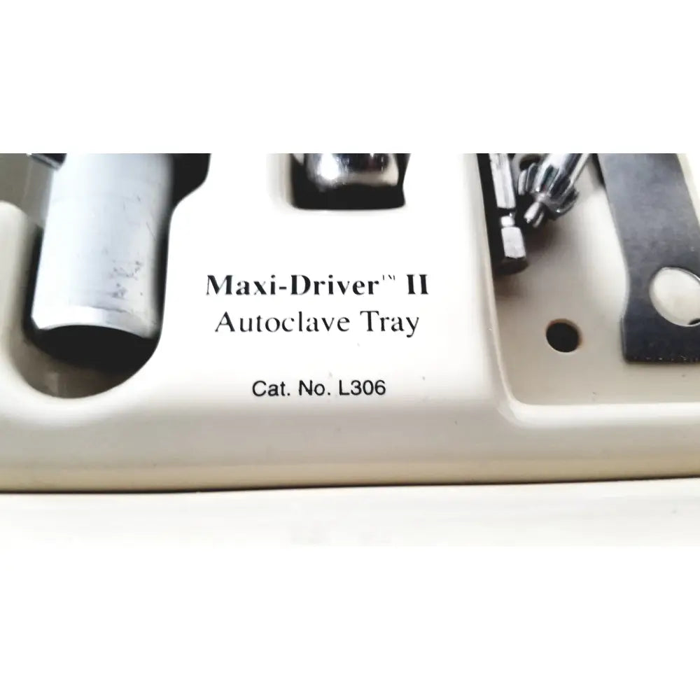 White plastic 3m maxi driver ii autoclave tray air powered holding metallic tools with catalog number l306