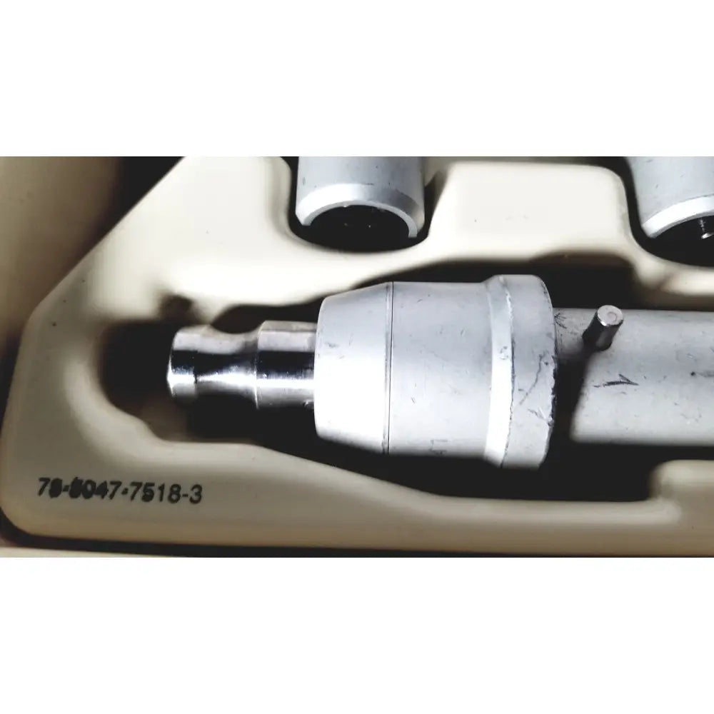 Silver metal drill bit with cylindrical shaft in beige case for 3m maxi driver ii autoclave tray air powered set
