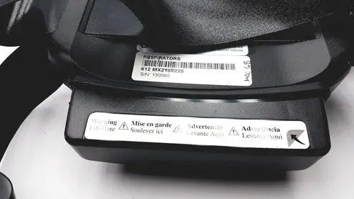 Black plastic respirator mask with barcode and multilingual warnings for papr versaflo blower mx2169225 product