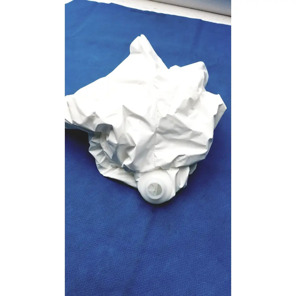 A crumpled white paper bag with a circular plastic handle accompanying 3m s-533s high durability hood with integrated head suspension