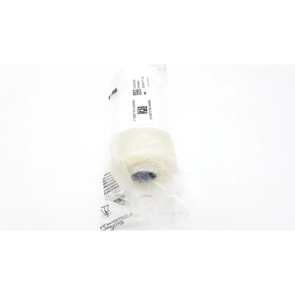 A white cylindrical filter element sealed in clear plastic packaging for 3m steri-drape roll prep drape 1000nsr