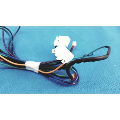 A bundle of multi-colored connector wire harness cables with white plastic connectors and black insulation tied by a white band