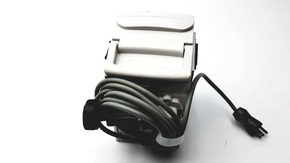 White plastic electric paper cutter with black power cord and plug for medical isolation gown level 2 cutting tasks