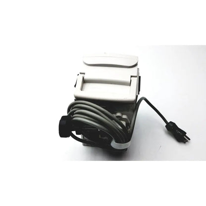 White plastic electric paper cutter with black power cord and plug for medical isolation gown level 2 cutting tasks