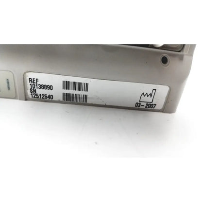 Silver metal engine control unit with label shown alongside 60 count medical isolation gown level 2 product details