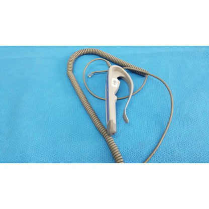 Gray and white remote control with coiled cord for patient lift chair featuring two functions for patient lift use