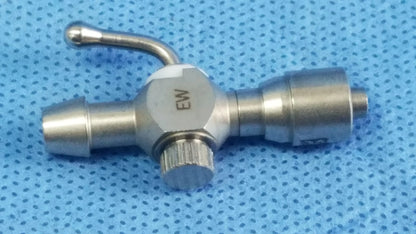 Stainless steel 75u universal stopcock with knurled adjustment knob and engraved ew marking for fluid management