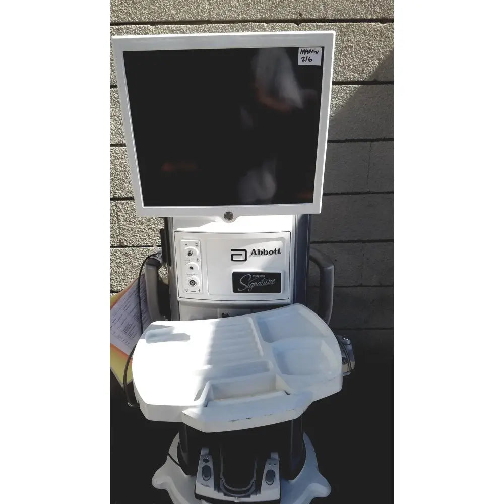 White abbott whitestar signature phacoemulsification system with monitor and tray for advanced eye exams