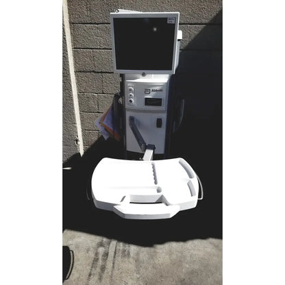 White Abbott Whitestar Signature phacoemulsification system with touchscreen monitor and attached patient tray