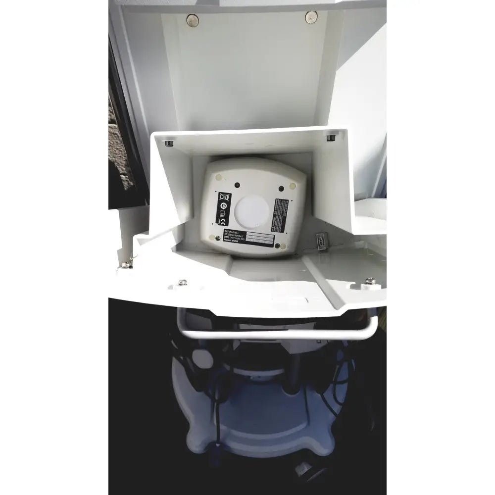 Back side of white plastic abbott whitestar signature phacoemulsification system device with circular opening in protective casing