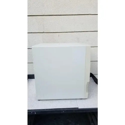 White plastic computer case of abi prism 7000 sequence detection system with rectangular design and side ventilation slits