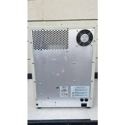 Silver metallic industrial fan unit with perforated panel on the back of the abi prism 7000 sequence detection system