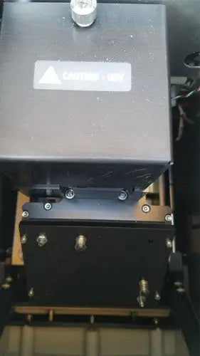 Black abi prism 7000 sequence detection system laser engraving machine with silver warning label and metallic bolts
