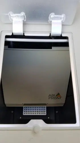 Silver metallic abi prism 7000 sequence detection system with sleek rectangular design and black accents for reuse medical use