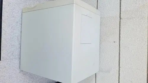 White rectangular outdoor electrical junction box mounted on wall for abi prism 7000 sequence detection system use