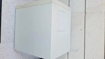 White rectangular outdoor electrical junction box mounted on wall for abi prism 7000 sequence detection system use