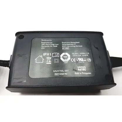 Black plastic power adapter aa24750l-001 with matte finish and printed label for respironics astec series product