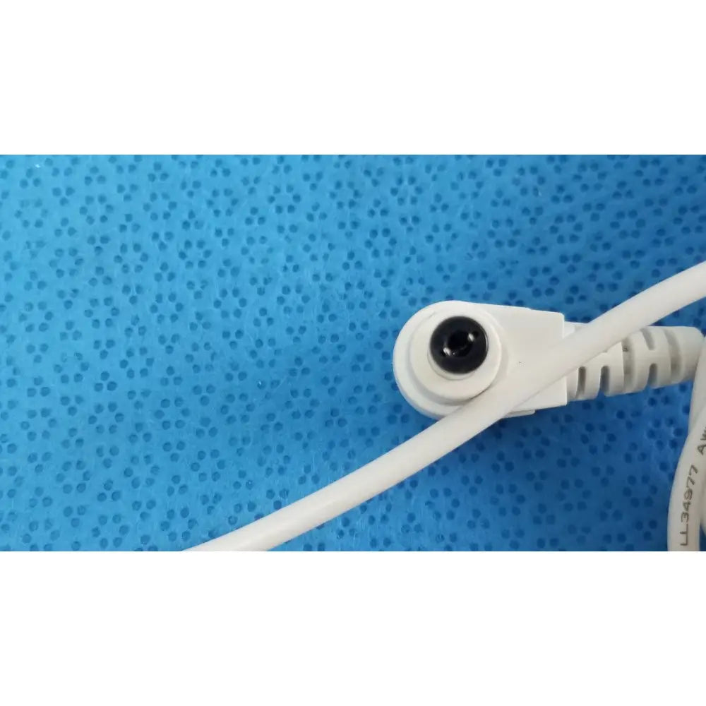 White power adapter sed80n2-24 with circular black input port and ribbed cable end for 24v 2.65a power supply