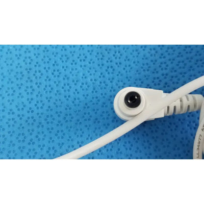 White power adapter sed80n2-24 with circular black input port and ribbed cable end for 24v 2.65a power supply