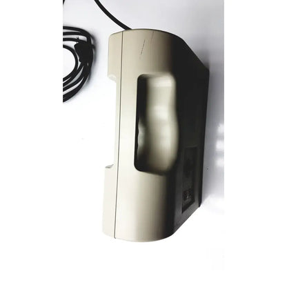 Beige plastic telephone with molded hand grip and black cord as control unit for accumax quantum convertible pressure redistribution system
