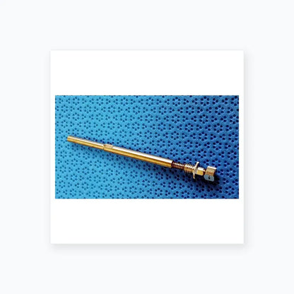 Silver-colored metal screw with threaded shaft and knurled knob in ace 765-1001 sterilization tray for dental implant equipment