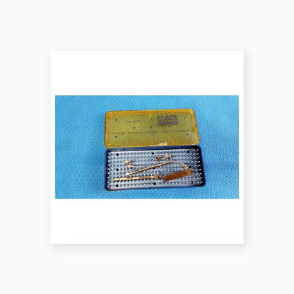 Ace 765-1001 sterilization tray with straumann dental implant surgical instrument kit in blue and gold plastic case with metallic tools