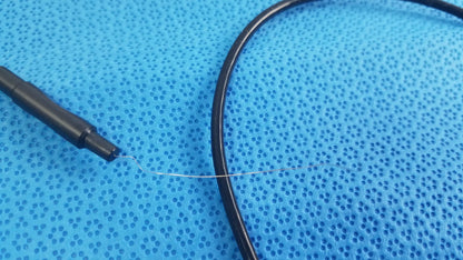 Black cable with thin metallic wire extending from sterlization tray with stryker 8400-815-005 multigen radiofrequency probe
