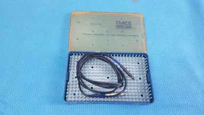 Black coiled cable with blue connectors in a blue and beige sterilization tray for Stryker multigen radiofrequency probe