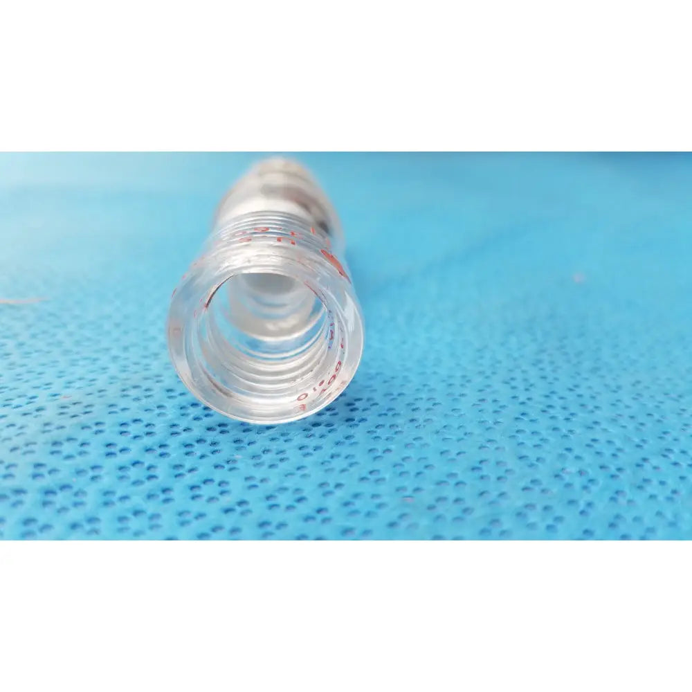Clear plastic syringe with red markings paired with ace glass 24/40 joint mini ace-thred thermometer adapter