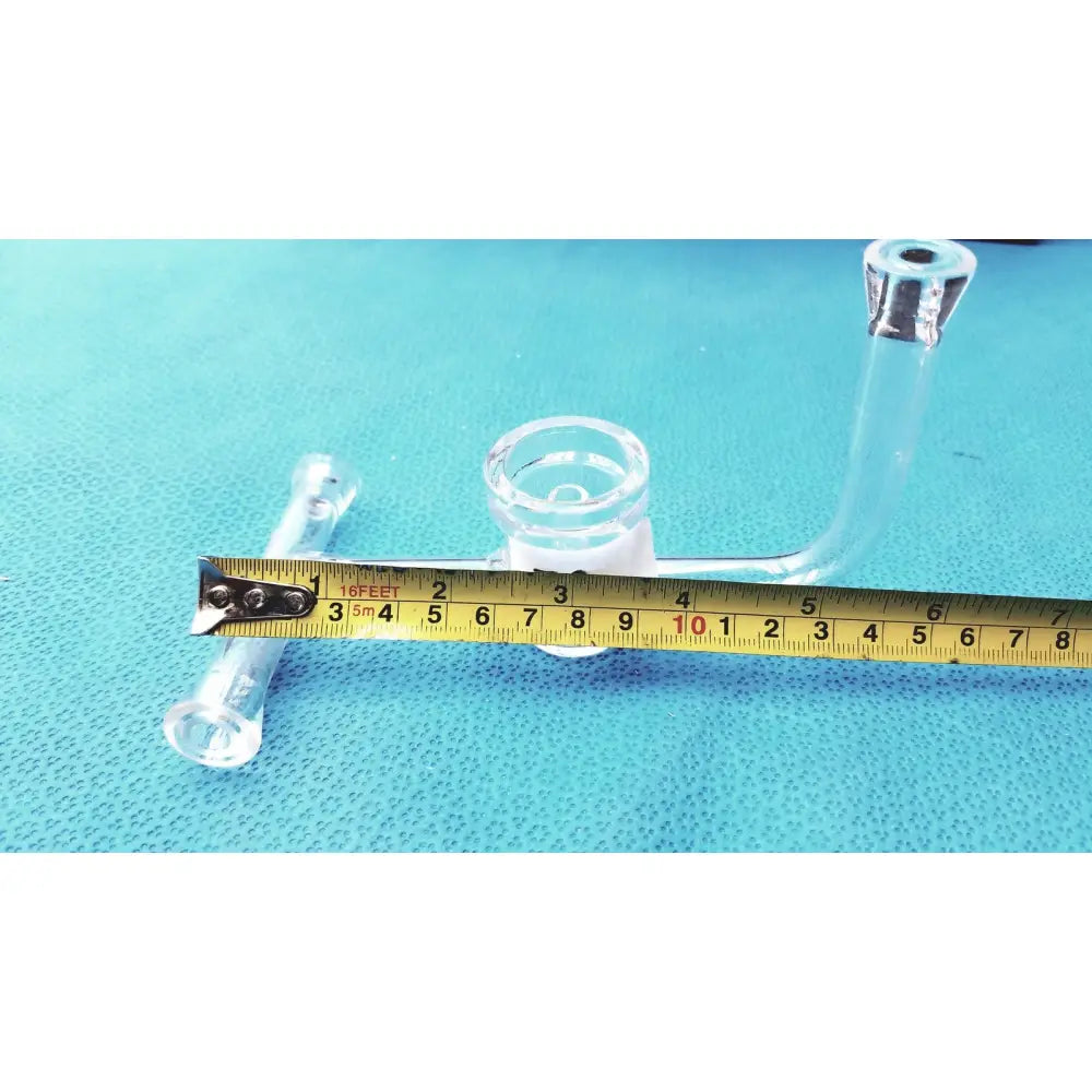 Ace glass straight bore stopcock made of clear borosilicate glass with a curved arm and metallic accents