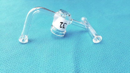 Clear glass ace glass straight bore stopcock with curved arm and white ce label made of borosilicate lab glass