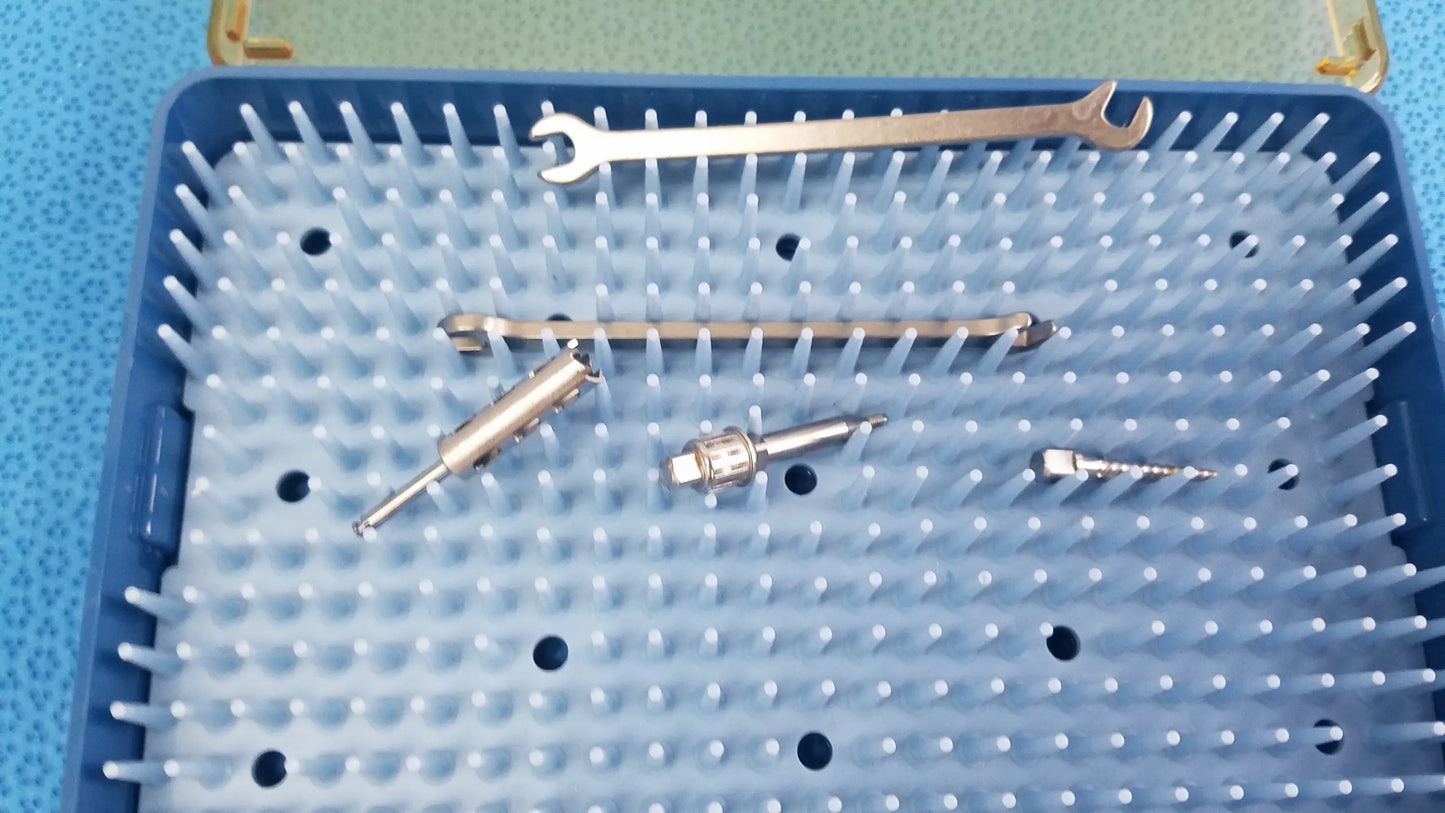 Blue plastic tray holding ace ophthalmology micro surgery surgical instruments for reuse medical equipment by smiths medical