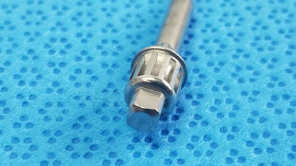 Silver metallic bolt with hexagonal head and serrated collar from ace ophthalmology micro surgery surgical instruments tray for medical equipment reuse