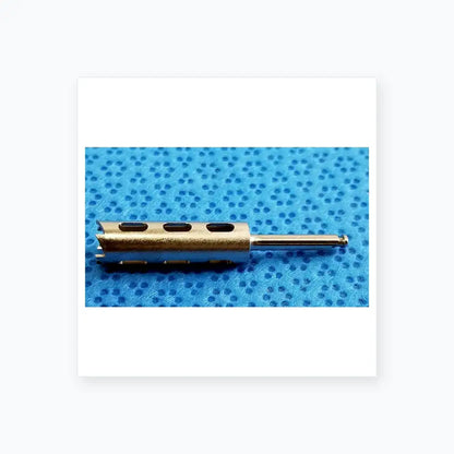Silver metal drill bit with three elongated slots and straight shank for reuse medical equipment by smiths medical