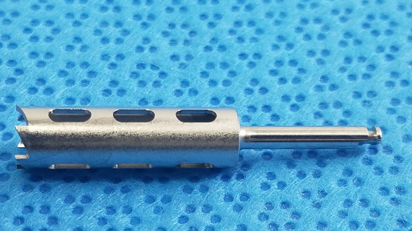 Silver metal drill bit with three elongated slots and straight shank for reuse medical equipment by smiths medical