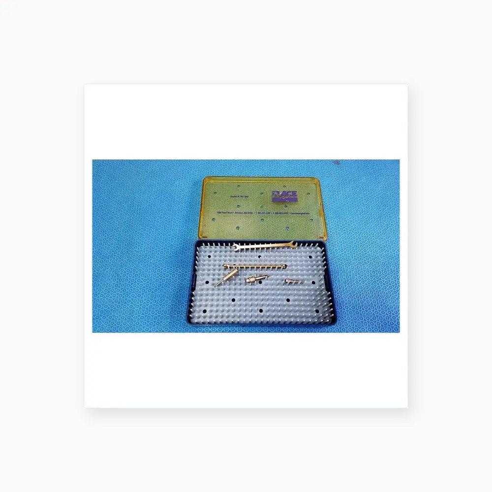 Blue plastic surgical instrument case with translucent green lid containing metallic tools for reuse medical equipment