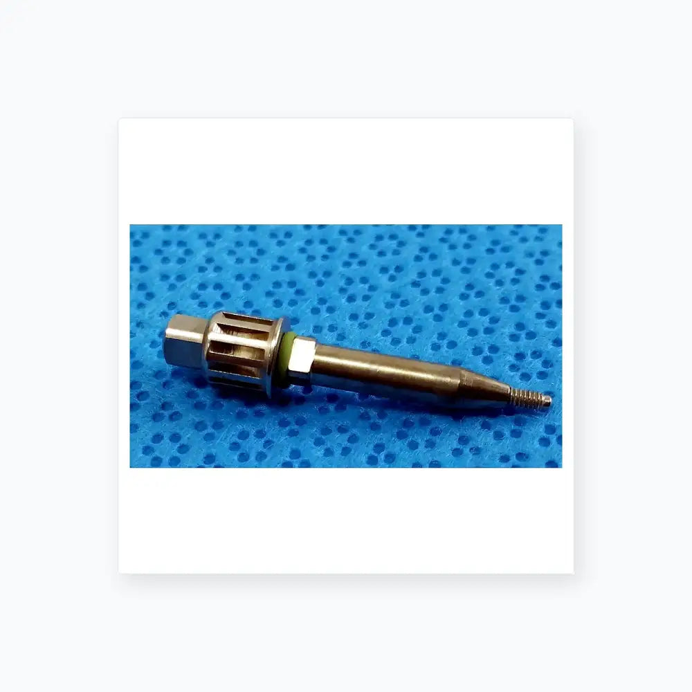 Silver metallic dental implant fixture with hexagonal head and threaded tip from smiths medical reuse medical equipment