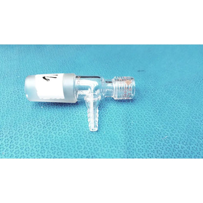 Clear glass lab glass fitting thermometer adapter with frosted white cap and threaded connections for lab use