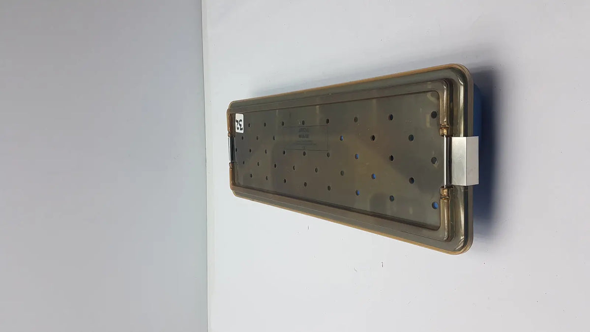 Rectangular metallic ACMI MRA-GT slimline sterilization tray with grid holes and reinforced edges for sterilization use