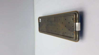 Rectangular metallic ACMI MRA-GT slimline sterilization tray with grid holes and reinforced edges for sterilization use