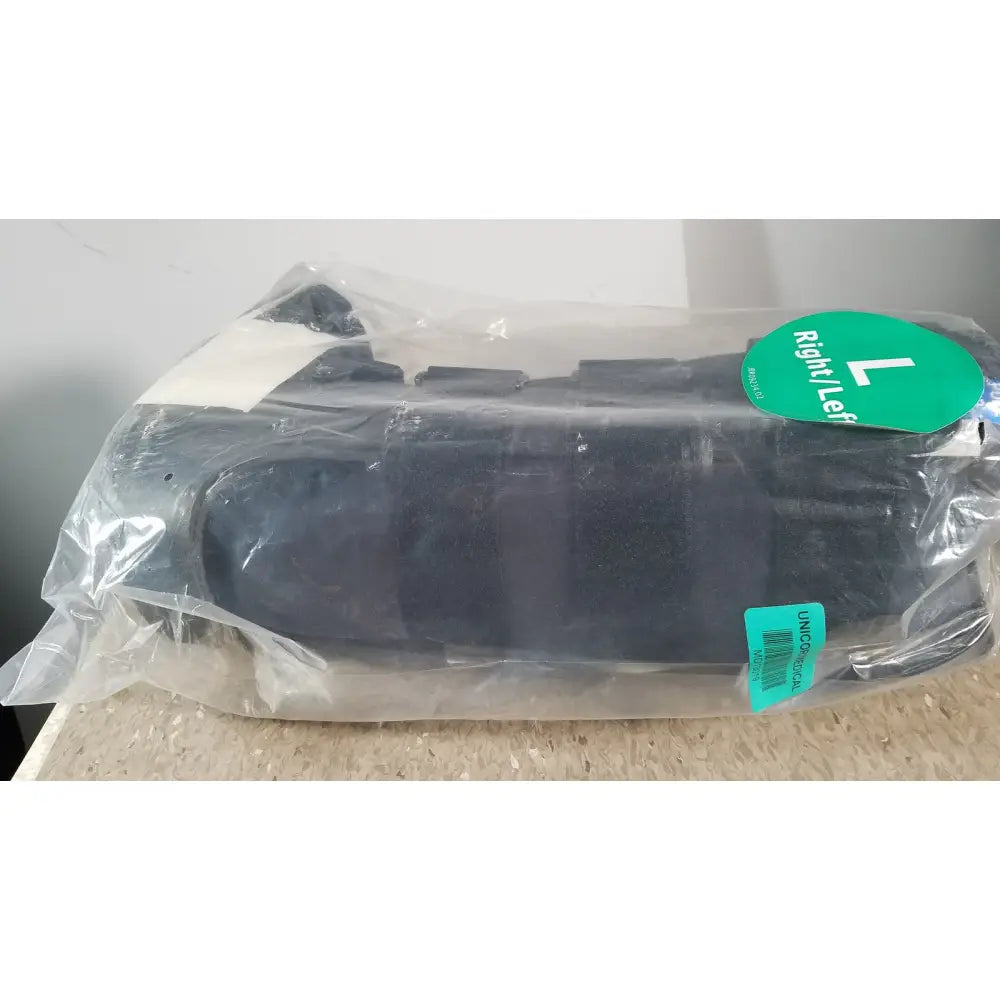 Black plastic car seat belt buckle set in clear packaging for actimove standard walker boot achilles high large right left