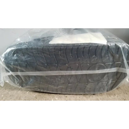Black rubber tire with deep treads wrapped in clear plastic for actimove standard walker boot achilles large right left