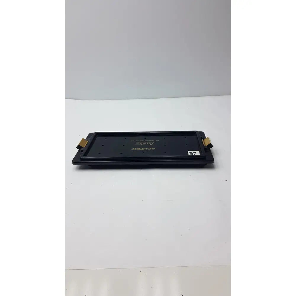 Black plastic acufex suretac instrument system tray case with gold metal clasps for hearing aid storage