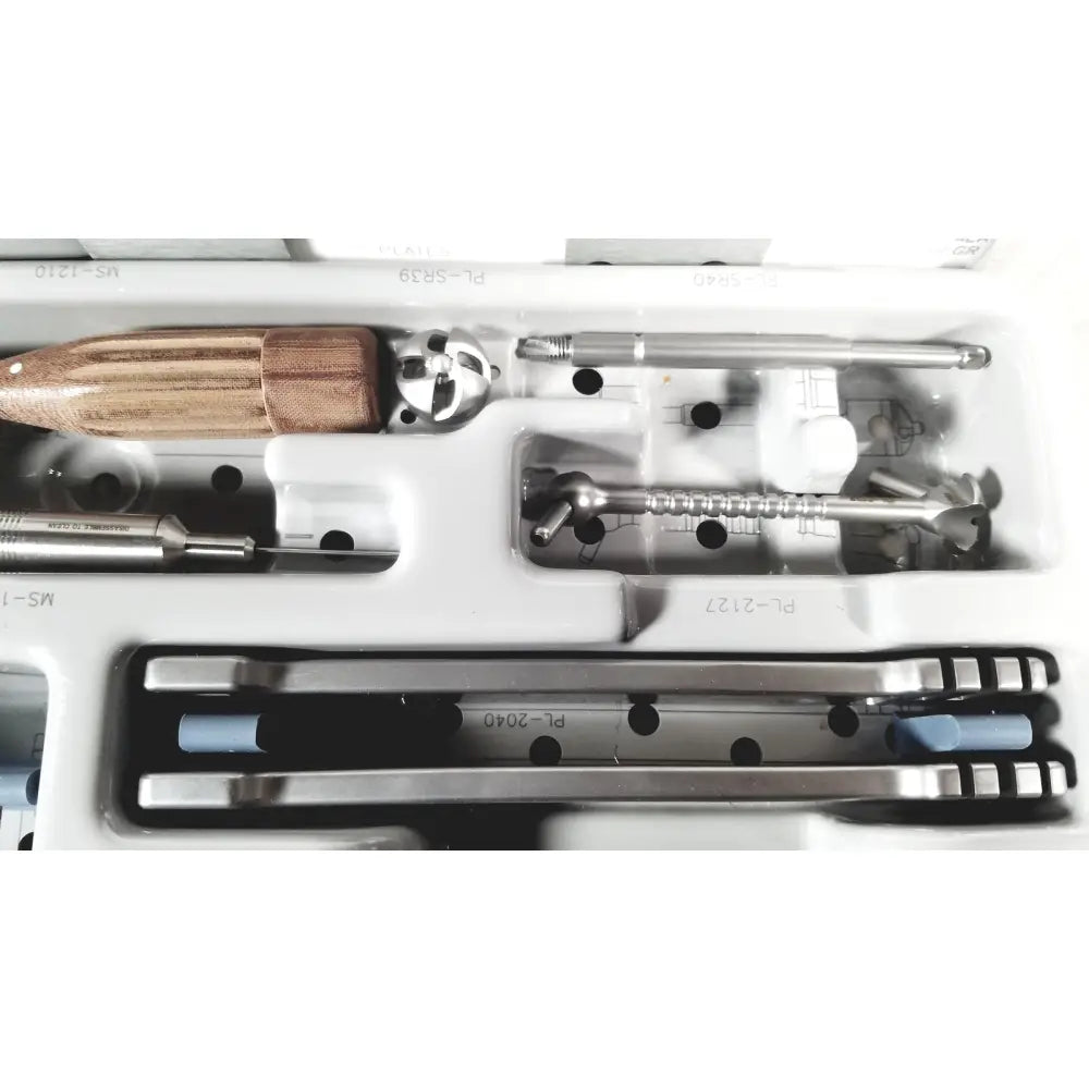 Wooden-handled surgical instrument with metallic components and engraved markings from acumed modular hand set missing piece