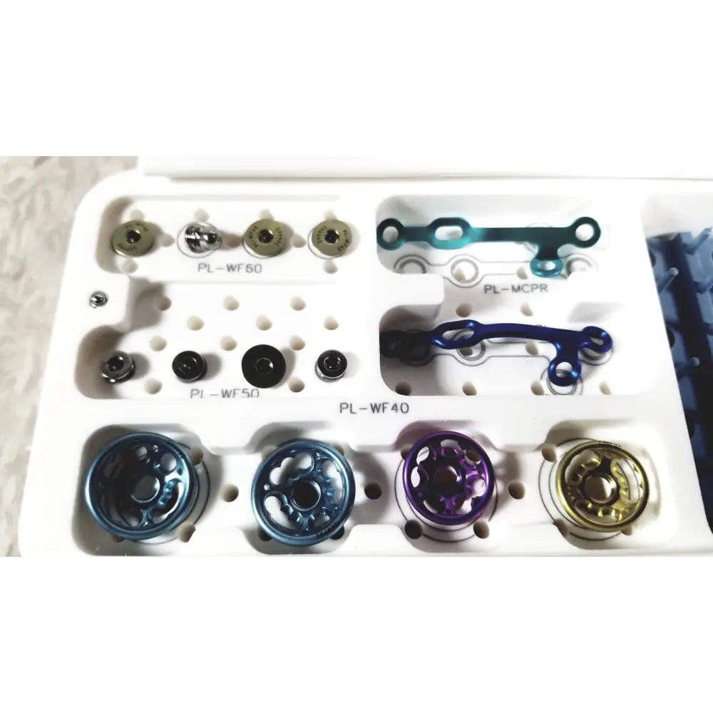 The acumed modular hand system set with colorful surgical plates and screws for precise hand fracture fixation