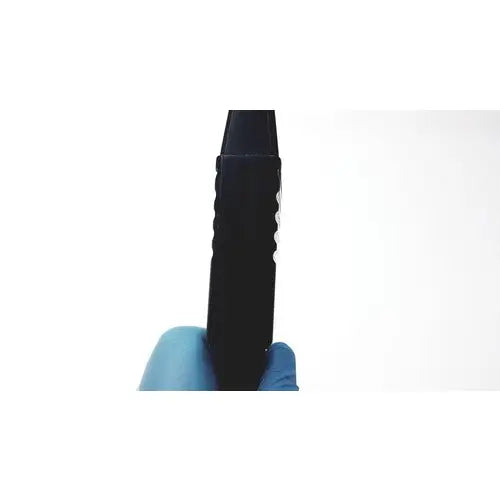 Black textured handle of acuson l7384 linear array ultrasound transducer probe held in blue-gloved hands