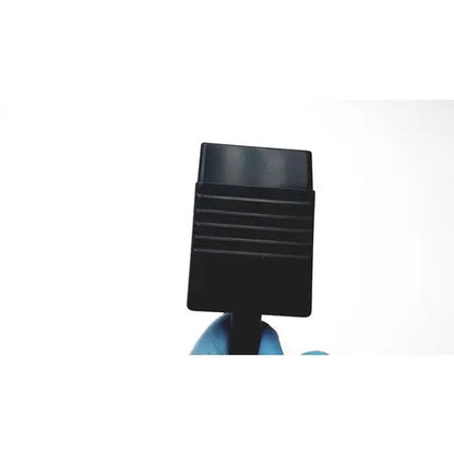 Black plastic obd2 diagnostic connector held in gloved hand viewed with acuson l7384 linear array ultrasound probe