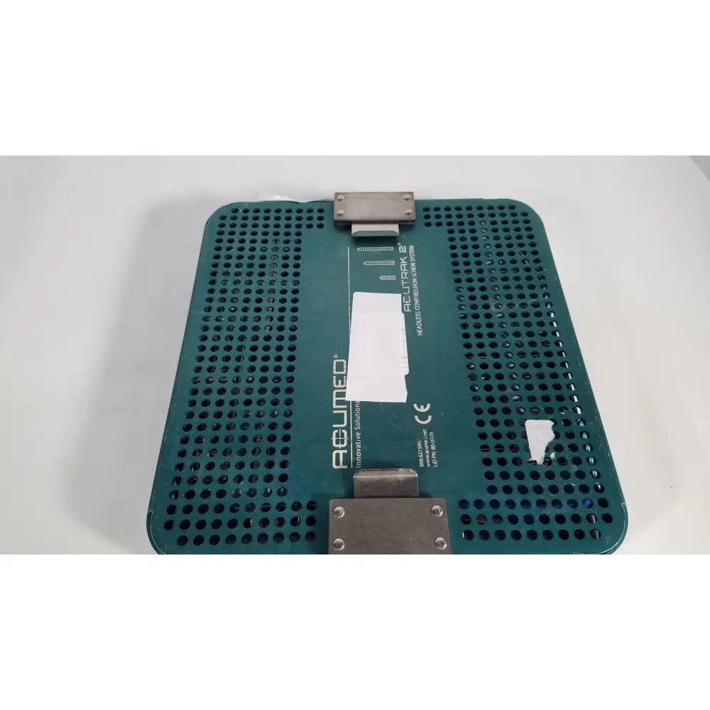 Teal perforated plastic acutrack 2 platform with metal clamps for acutrak 2 headless compression screw system reuse medical use