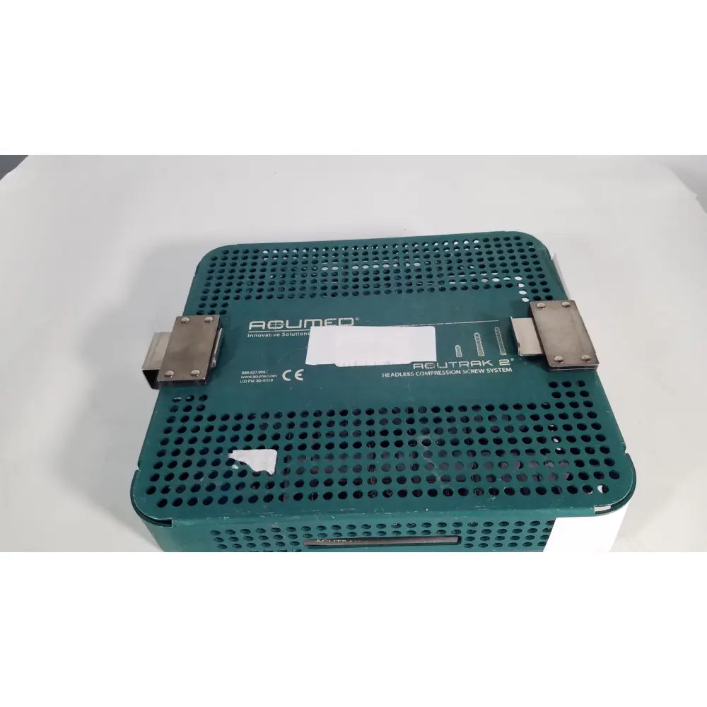 Teal green perforated plastic surgical instrument tray with metal clamps for acutrak 2 headless compression screw system reuse medical